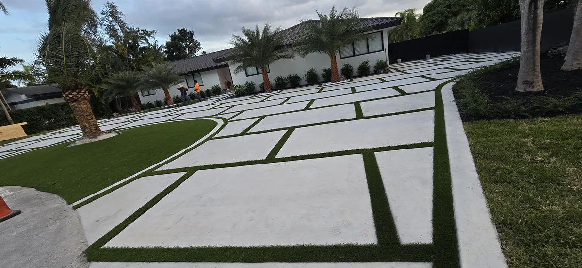 Paver-and-turf grid driveway