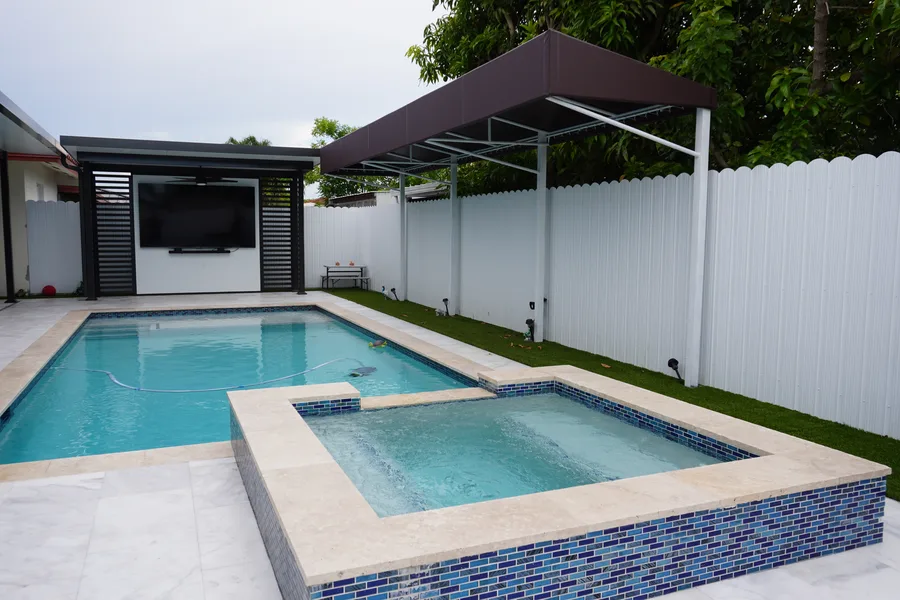 Outdoor living space with pool and pergola